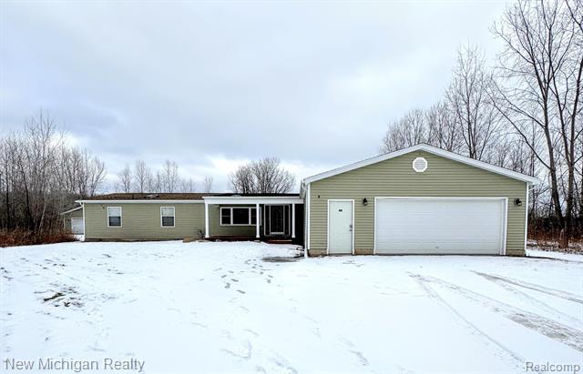 front view picture of 7198 Sheridan Road, Flushing, MI. 48433