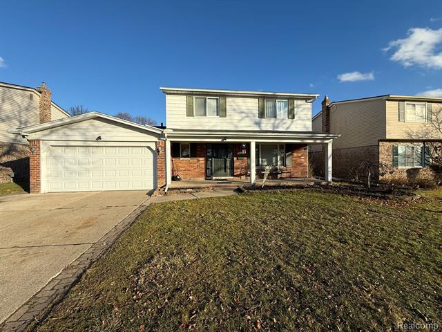 front view picture of 36122 Almont Dr, Sterling Heights, MI. 48310